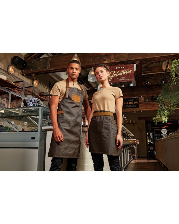 Schort PREMIER Division - Waxed look denim bib apron with faux leather voor bedrukking & borduring