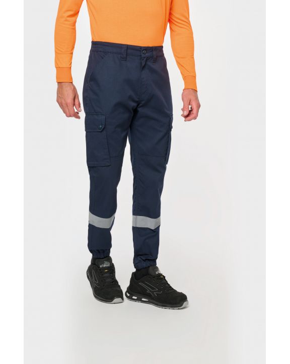Pantalon personnalisable WK. DESIGNED TO WORK Pantalon cargo unisexe avec bas élastiqué et bande réfléchissante